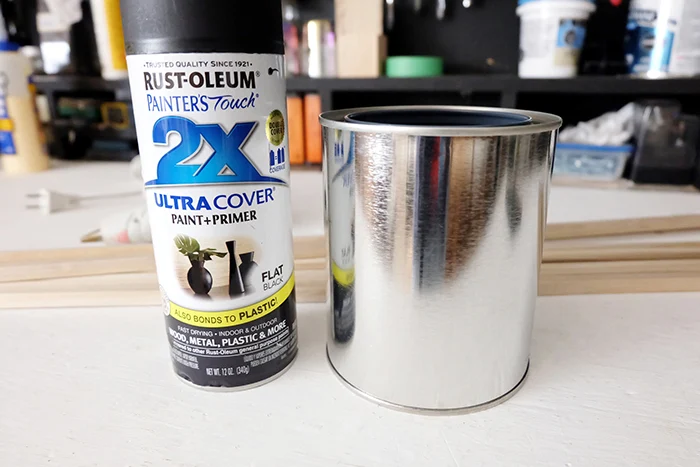 flat matte black spray paint and quart paint can