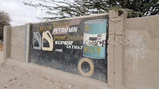 Garage paints its oil can on the wall