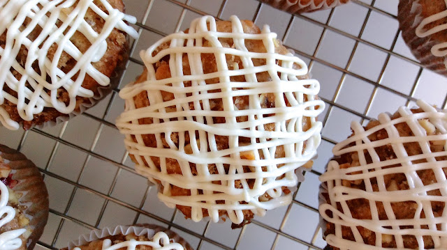 Cranberry Bliss Muffins on a wire cooling rack