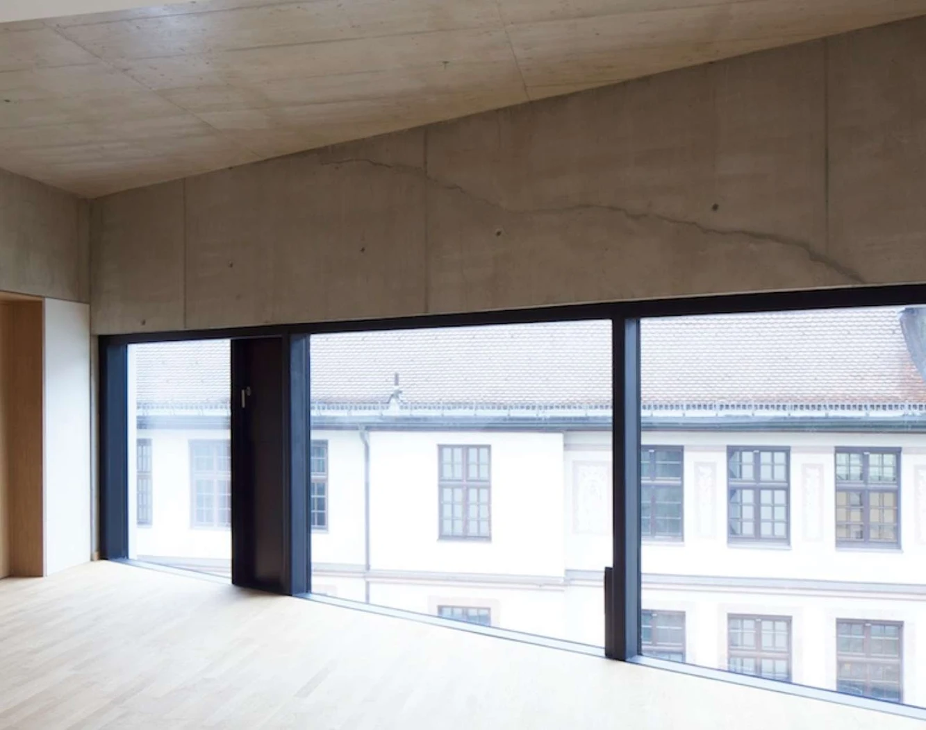 School Extension with Crinkled Wall by Johannes Wiesflecker