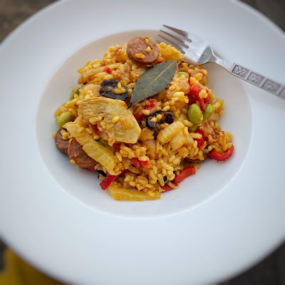 Stock cupboard paella on a dish with a fork