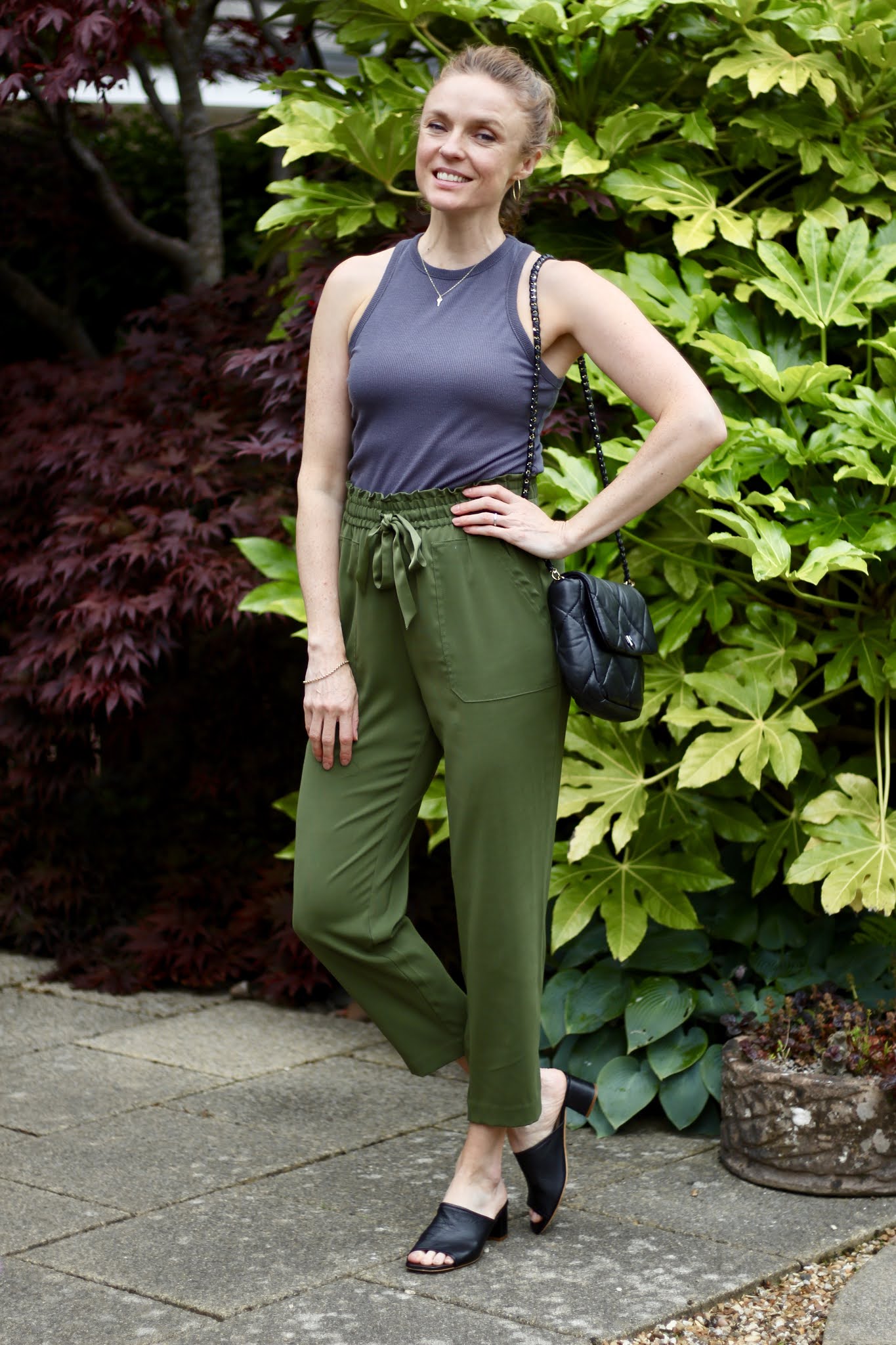 Grey tank, green joggers, black mules • Fake Fabulous