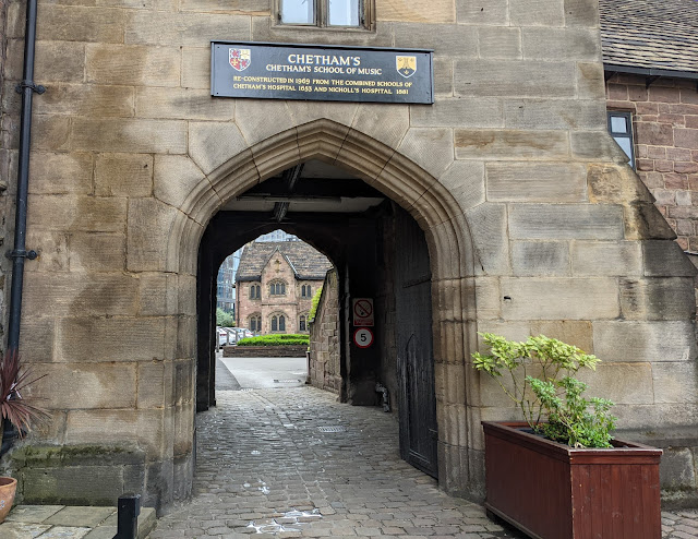 Old stone archway and entrance to Chetham's Library