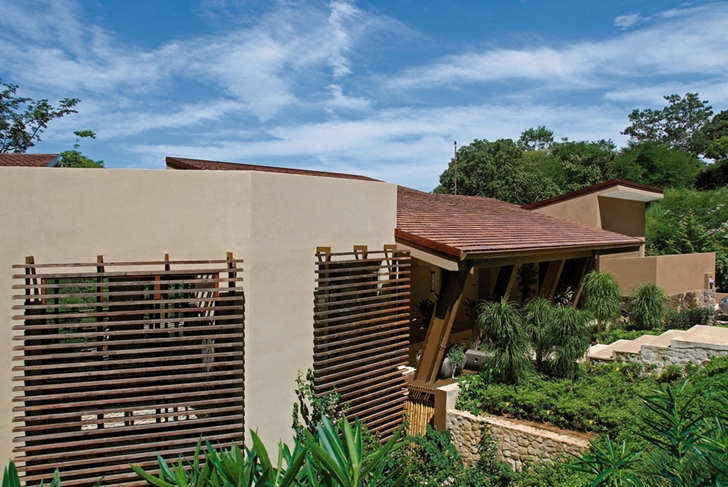 Uphill facade of Bartlett Home by SARCO Architects
