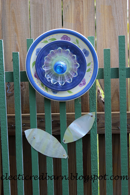 Eclectic Red Barn: Blue Plate Flower with soda can leaves
