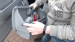 If you want to remove the Mazda Bongo glove box you need to locate the pegs shown in the picture (one located each side of the box)