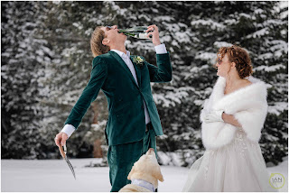 groom drinking straight from champagne bottle