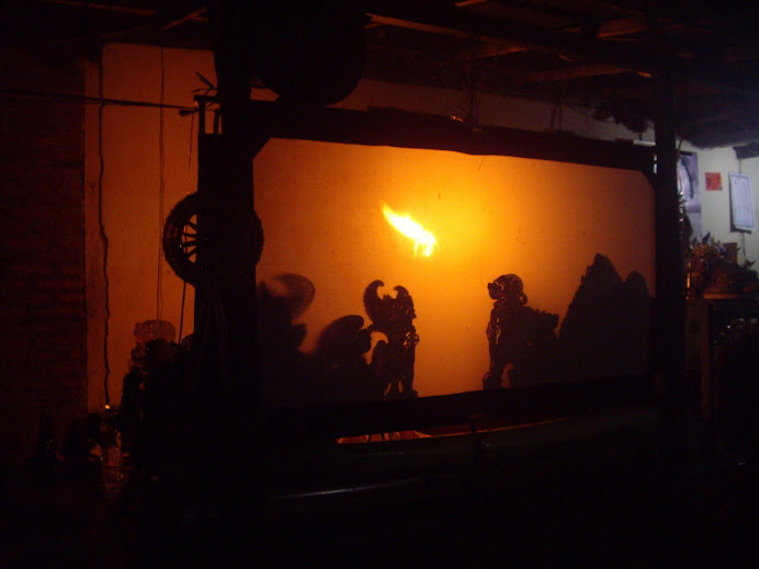 SACRED WAYANG KULIT SHADOW PLAY PERFORMANCE AT A HOME COMPOUND IN SERIRIT, BALI.