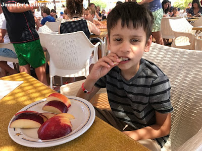 Child eating hotel buffet