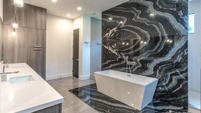 the use of an accent stone in a modern bathroom