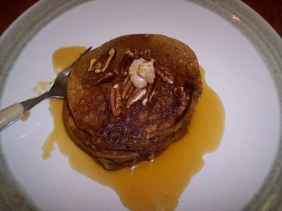 Serving plate of sweet potato pancakes.