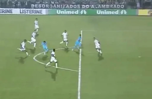 Santos forward Neymar shoots to score from outside the penalty area against Figueirense