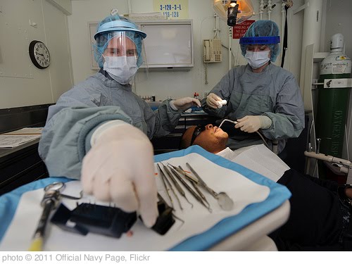 'Dental procedure aboard USS Abraham Lincoln.' photo (c) 2011, Official Navy Page - license: http://creativecommons.org/licenses/by/2.0/