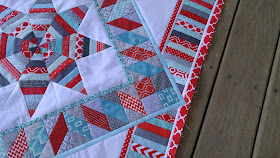 red and aqua round robin quilt