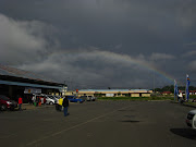 . Bandara Dominus Eduard Osok, Sorong, dengan disambut oleh pelangi yang . (img )