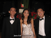 Band manager, band leader and keyboardist Jason Geh flanked by wedding couple Fiona and Abel