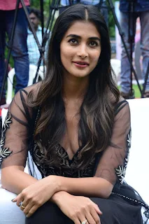 Actress Pooja Hegde Stills in black dress at Valmiki movie Press Meet