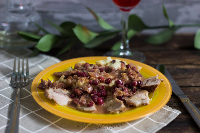 Meat with cranberries and mustard