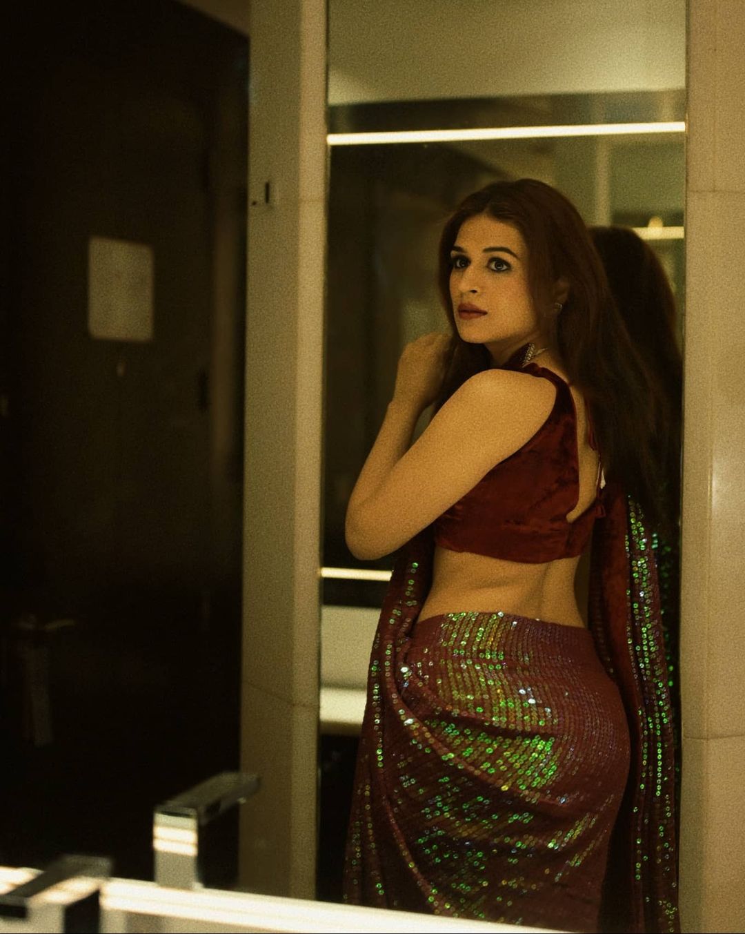 Shraddha Das in a backless velvet blouse