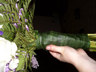 Not the best job wrapping the stems with floral tape, but it serves its purpose.