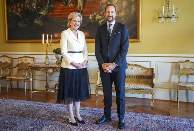 Princess Astrid wore a white blazer by Gucci, and navy tulle skirt by Dries van Noten, Marie Mero, Essentiel Antwerp, Marielle Stolkelaar