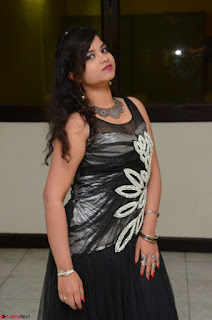 Shrisha Dasari in Sleeveless Short Black Dress At Follow Follow U Audio Launch 062.JPG