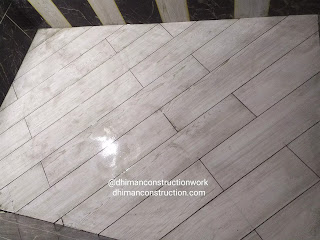 Small bathroom tile design with black and white tiles