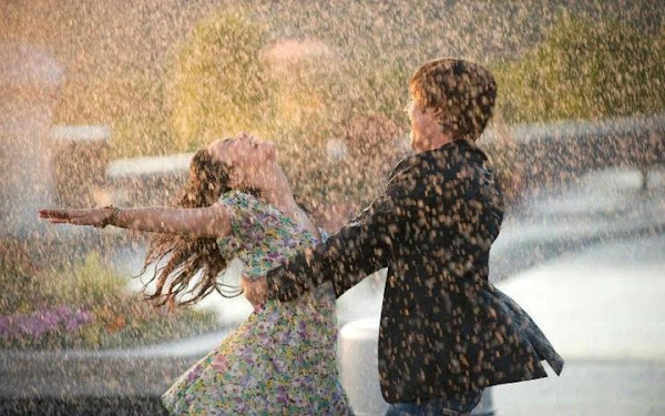 Girl Playing in Rain