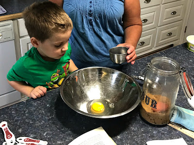 June 20, 2018 Watching my sister bake with her grandson