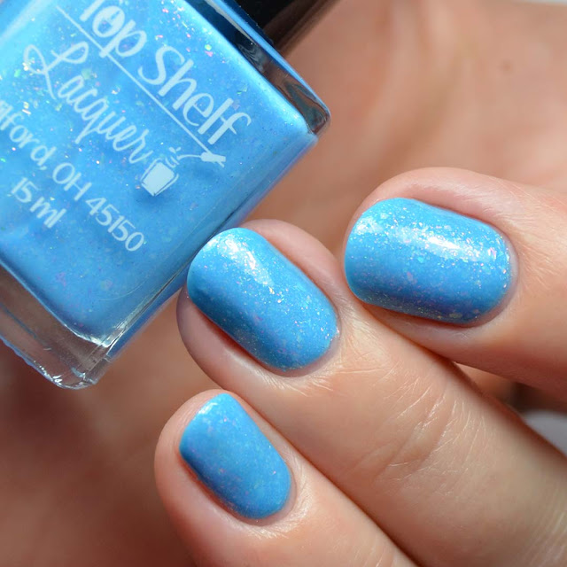 blue nail polish with color shifting flakies