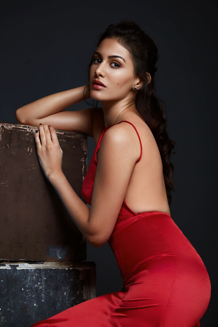 Amyra Dastur in a sizzling pose from her latest hot photoshoot, radiating glamour and confidence.