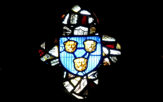 Loggerheads in stained-glass in the Trinity Chapel in St Mary’s Church