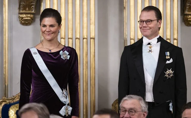 Crown Princess Victoria wore a faux-fur jacket by Filippa K, and a burgundy velvet maxi dress