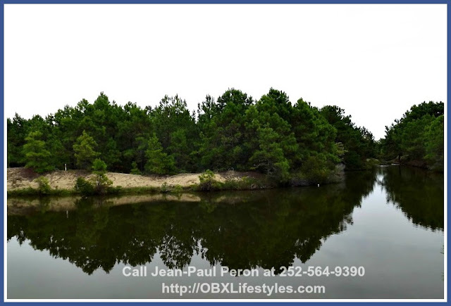 This stunning Outer Banks NC lot for sale in Carova Beach has mature live Oak trees on the property, Corolla Wild Horses roaming around the area, and a few scatterd neighbors. 