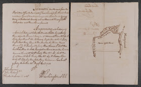 A page of handwriting and a small map.