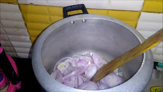 Once heated add chopped onions.