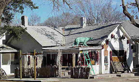 Taxidermist's bear form on an antiques shop in Florence, Colorado