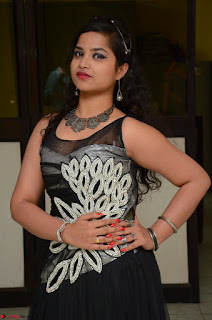 Shrisha Dasari in Sleeveless Short Black Dress At Follow Follow U Audio Launch 050.JPG