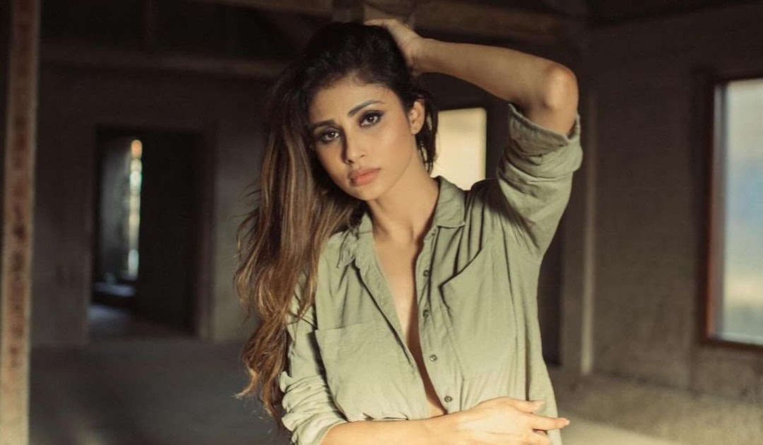 Mouni Roy’s Effortless Chic in Ripped Jeans and Stylish Shirt Top Sets Fashion Goals