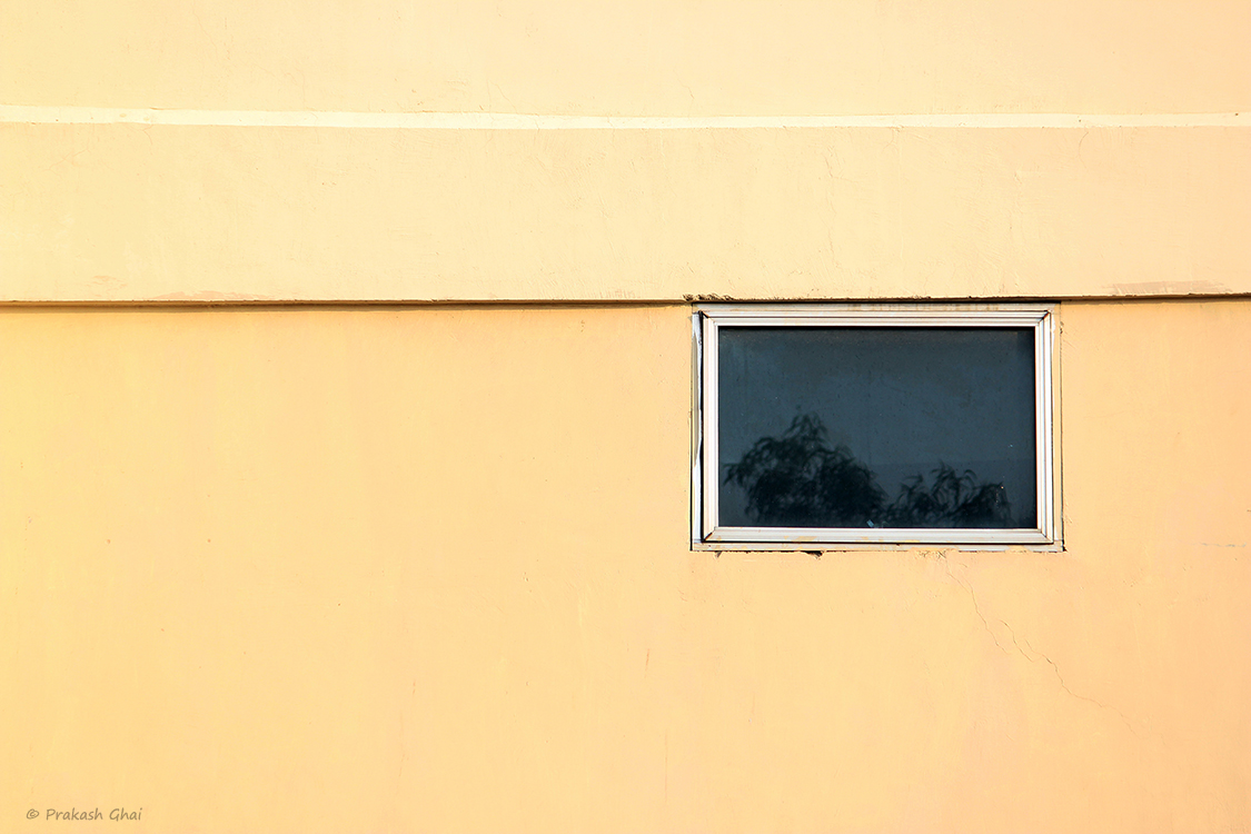 A Minimalist Photo of Two Rectangles on a colored wall