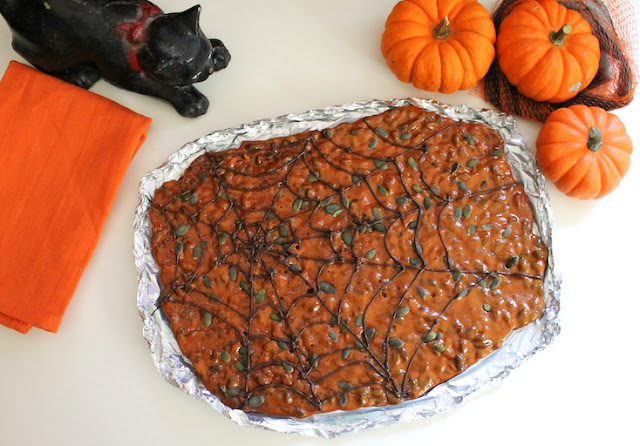 Food Lust People Love: Creepy Pumpkin Seed Brittle is a great seasonal party sweet and perfect for wrapping up to give as gifts for teachers, friends and coworkers. The crunchy pumpkin seeds toast and pop in the syrup as it cooks and caramelizes, flavoring the buttery brittle.