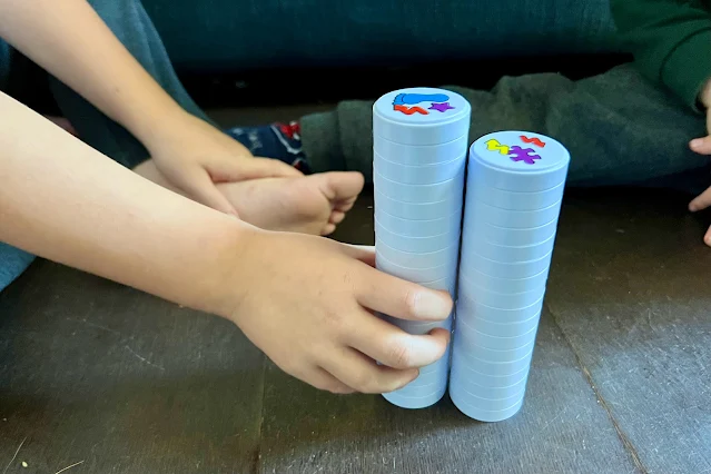 Two towers of magnetic round discs next to each other