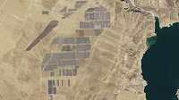 China's renewable energy industry is now the largest on earth. In February 2017, the world's biggest solar farm was opened at Longyangxia Dam, with 850 MW of capacity. (Photo Credit: NASA). Click to Enlarge.