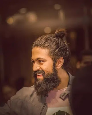 Naveen Kumar Yash High Bun Hairstyle