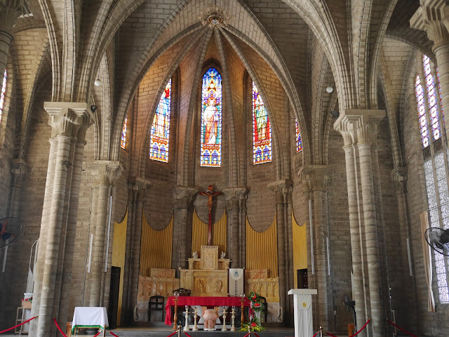 the altar and stained glass windows of Christ the King Cathedral in Nha Trang, Vietnam