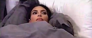 KIM KARDASHIAN THINKING IN BED