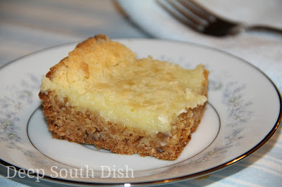 Wash Day Cake, or Gooey Butter Cake as it is more well known, is a simple cake using cake mix to form a crust and topped with a powdered sugar and cream cheese filling.