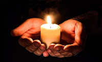 A Candle in hands