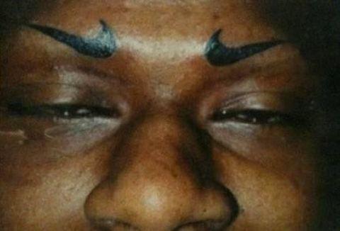 nike tattoo. tattoo eyebrows. Nike tattoo