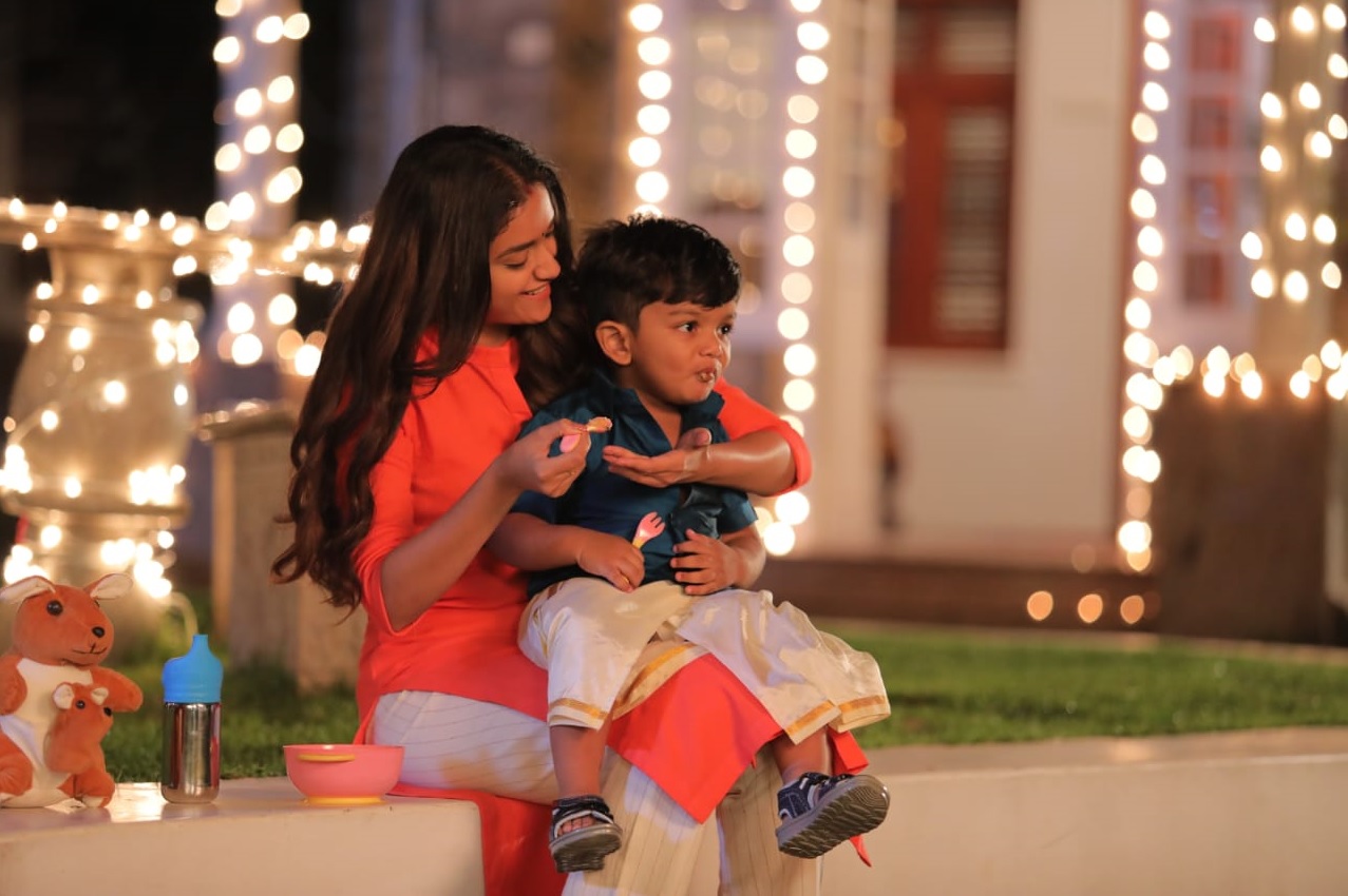 Keerthy Suresh with Cute and Awesome Lovely Smile with a Cute Boy in Penguin